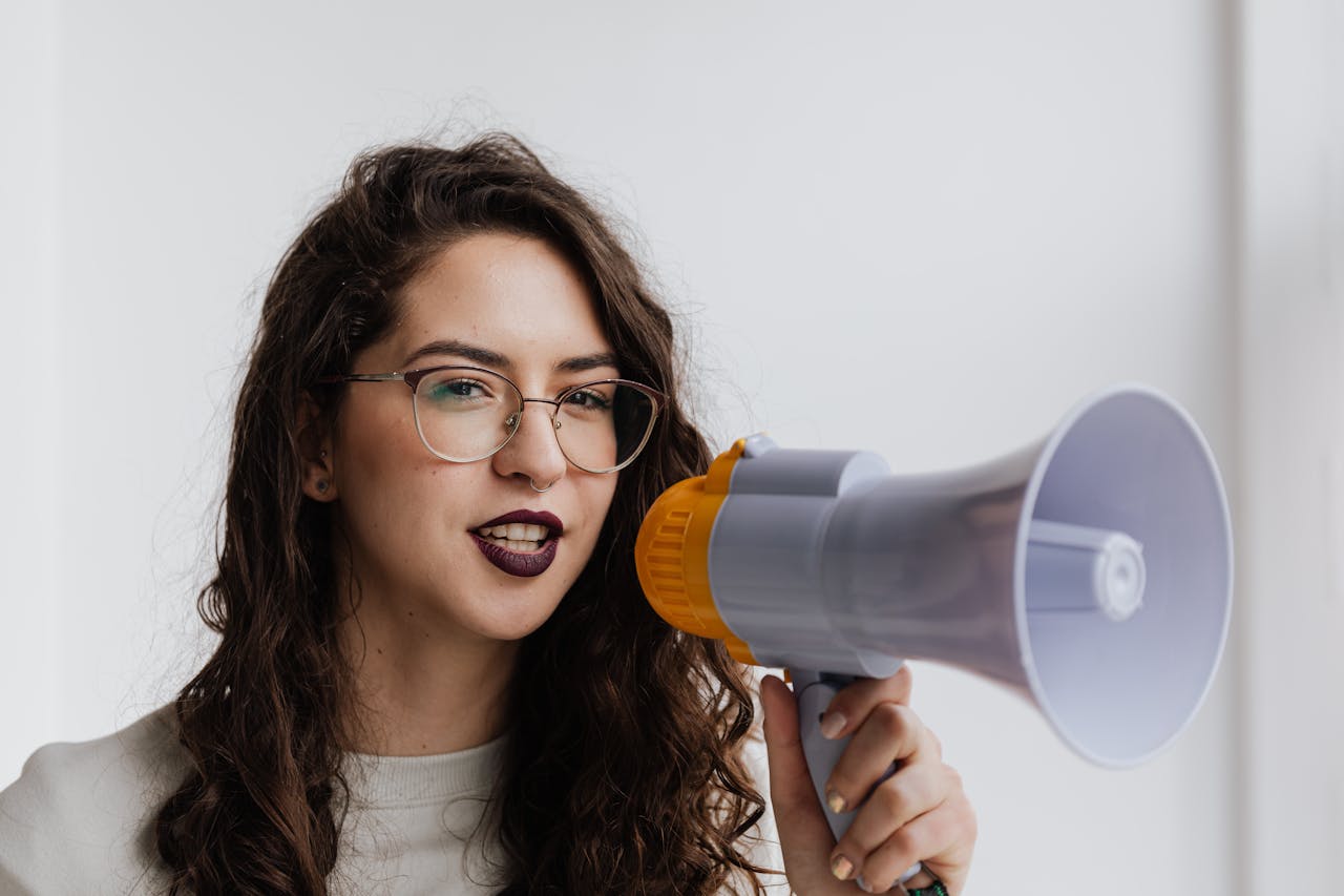 Person holding a megaphone